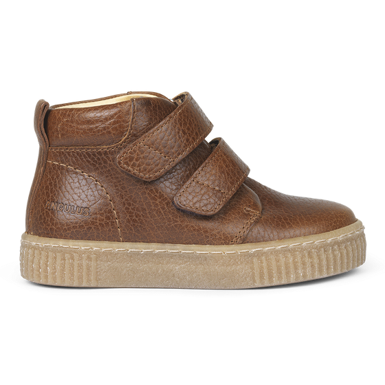 Sneaker with adjustable velcro closure