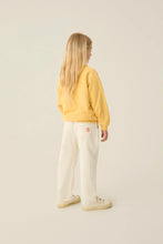 Load image into Gallery viewer, Брюки Bicolor Patches Ecru
